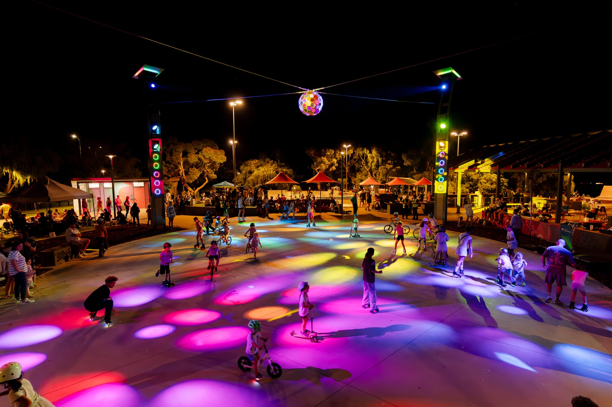 kids roller skatting at night